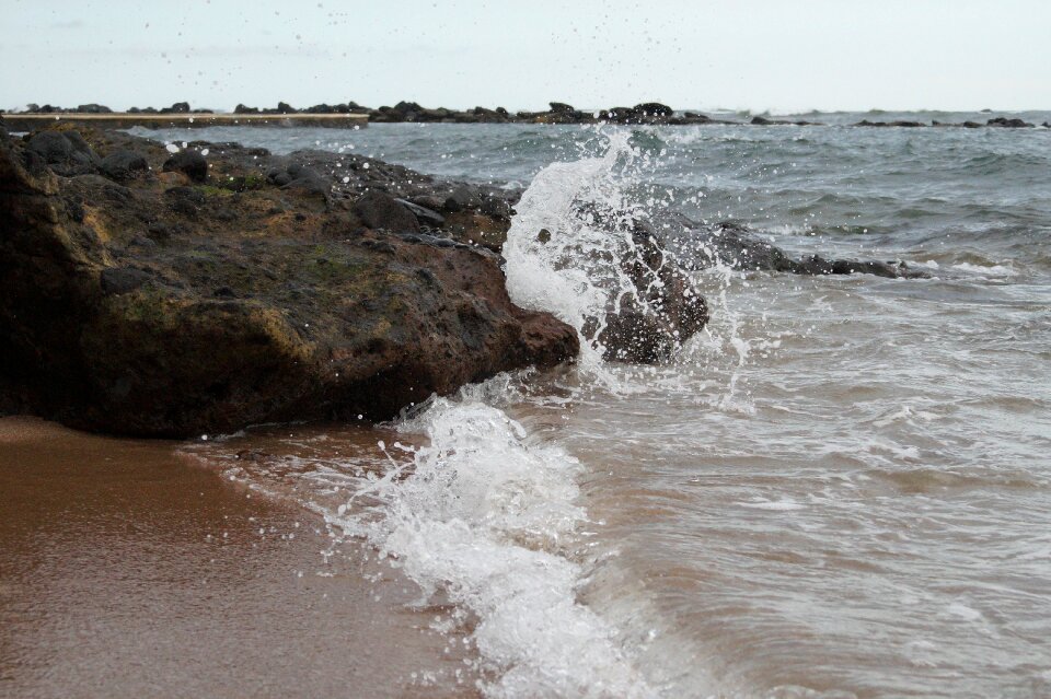 Beach sand edge of the sea