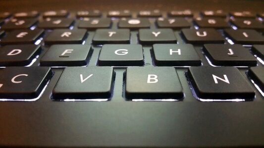 Laptop computer gray keyboard photo