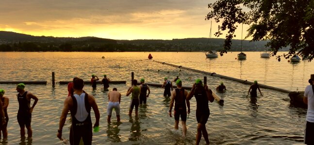 People swimming triathlon
