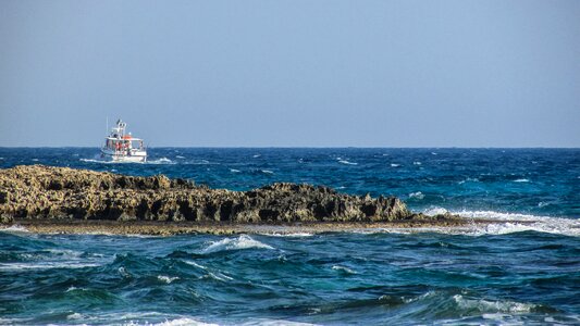 Afternoon fishing boat sea photo