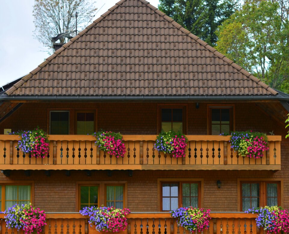 Farmhouse forest house balcony with flowers