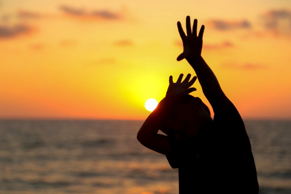 Hand sun touch photo