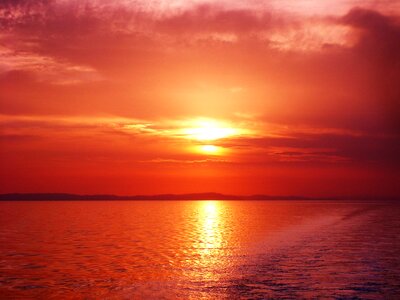Twilight sun ocean photo