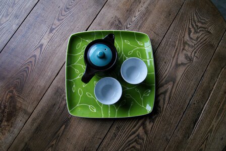 Wooden table teapot view immersed photo