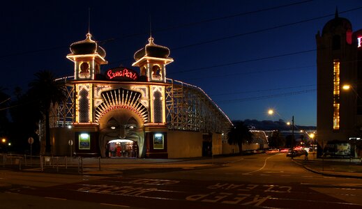 Amusement park night roller coaster photo