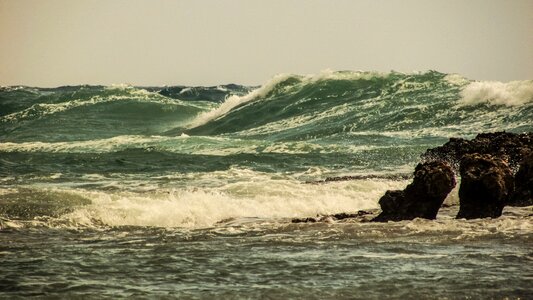 Waves rocky coast wild photo