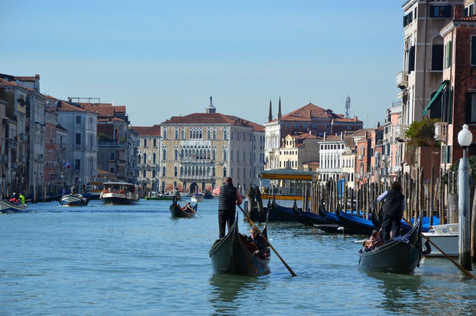 Gondolier boats town on the river