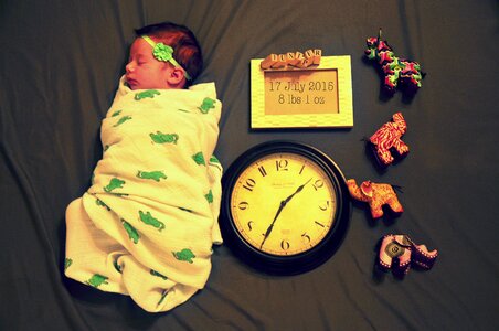 Newborn swaddle child photo