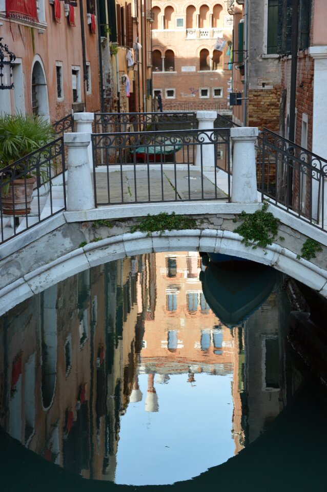 Mirroring water reflection houses photo