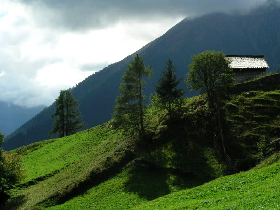 Alm mountain hut clouds