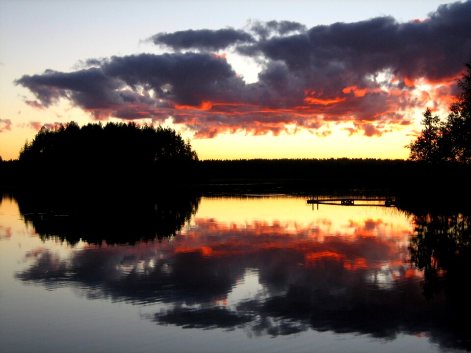Reddish clouds sky island