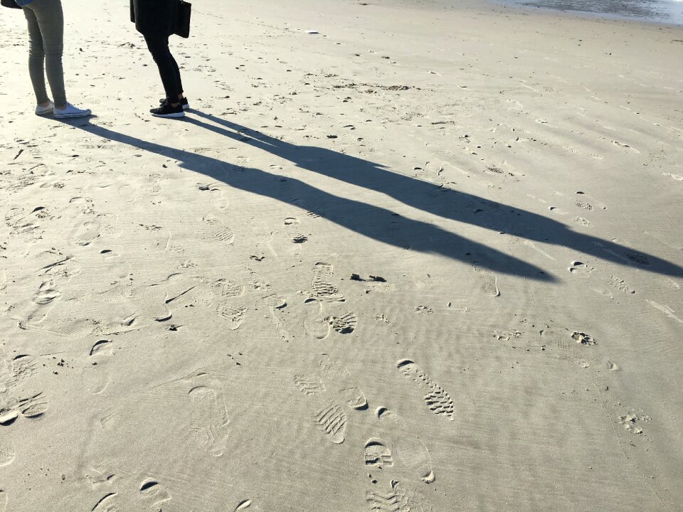 Sun sand footprints
