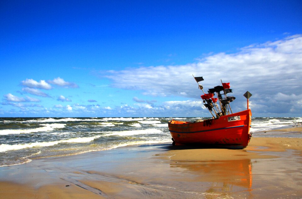 Fisherman baltic sea beach