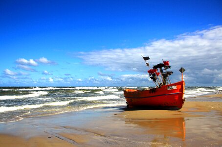 Fisherman baltic sea beach photo