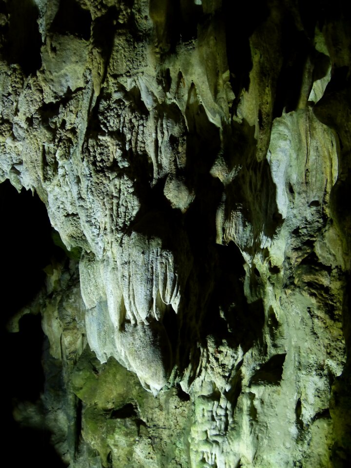 Stalagmites lighting grotto