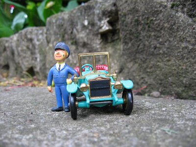 Gas station attendant oldtimer macro