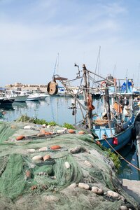 Networks boats in the harbor coast