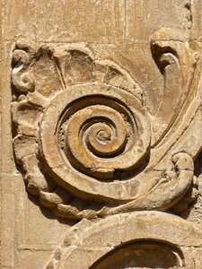 Carved stone church scroll
