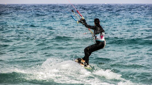 Woman athlete surfing