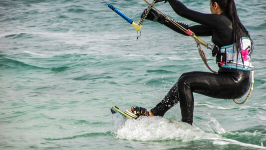 Woman athlete surfing