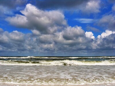 Clouds the coast sand