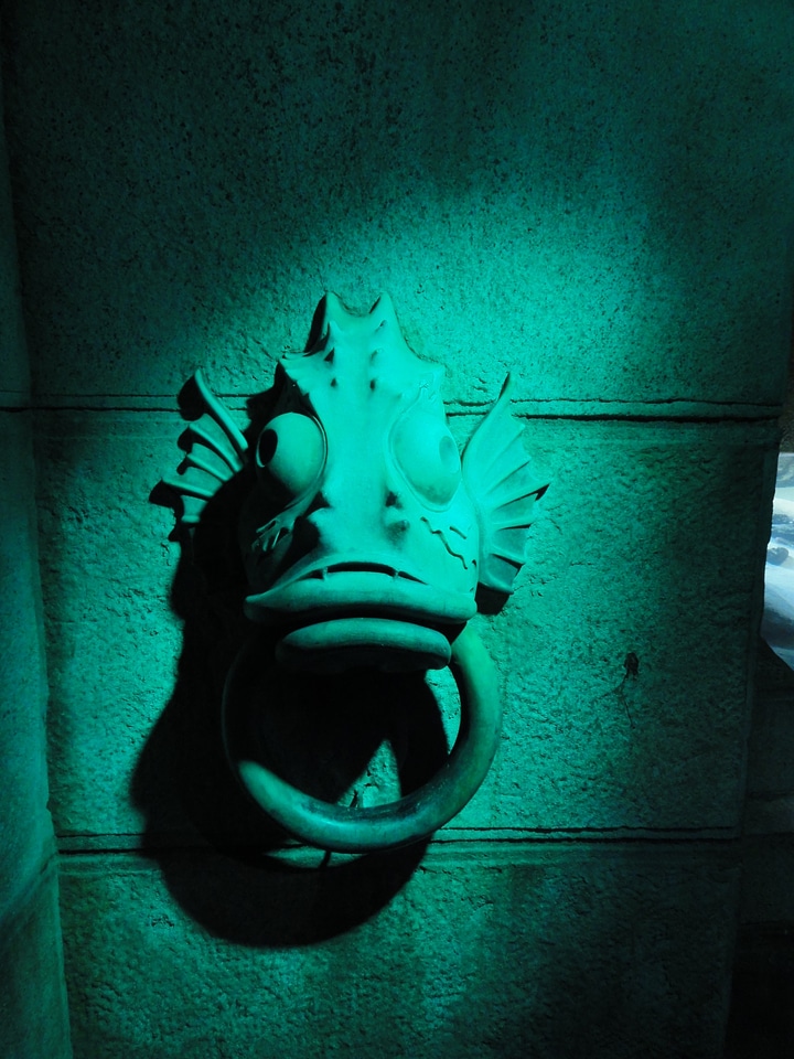 Door knocker statue stonework
