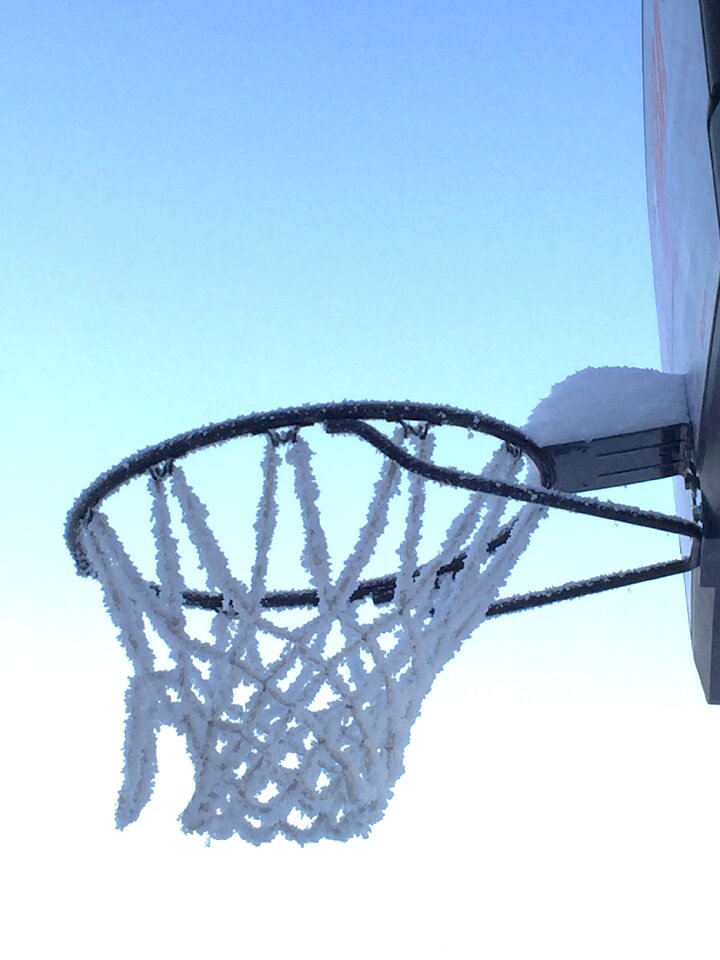 Winter basketball hoop cold photo