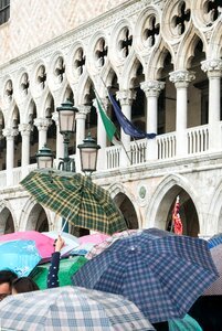 Crowd rain umbrellas photo