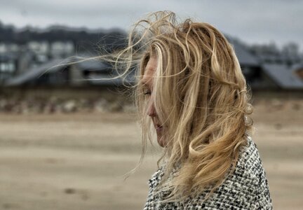 Beach long hair young woman photo