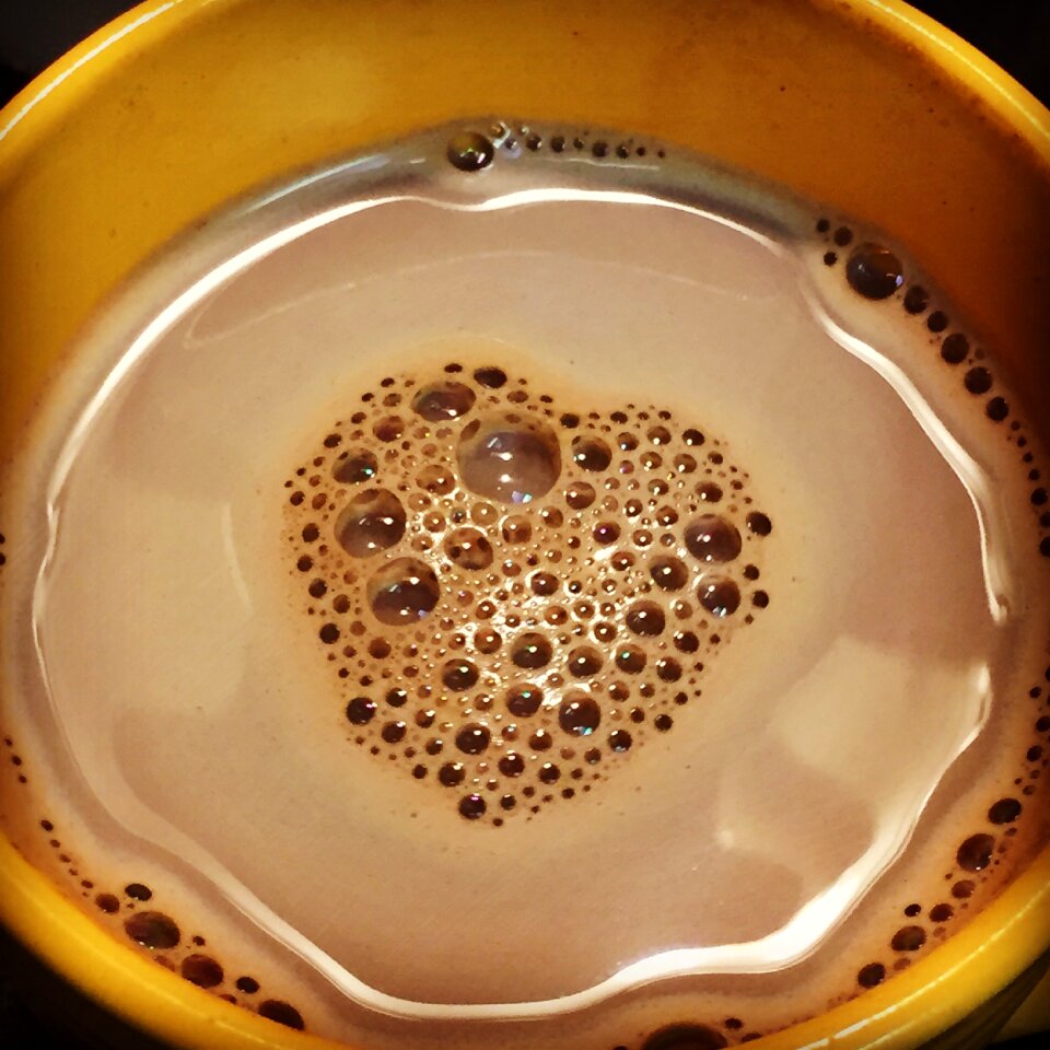 Heart bubbles cup of coffee