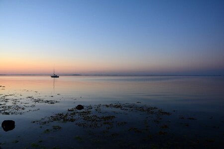 Coast blue sailing boat