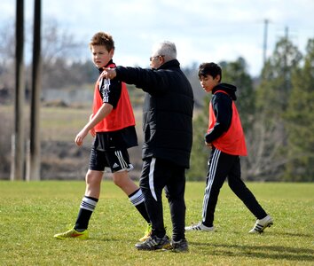 Playing soccer field practice photo