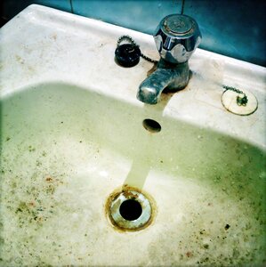 Dirty faucet bathroom photo