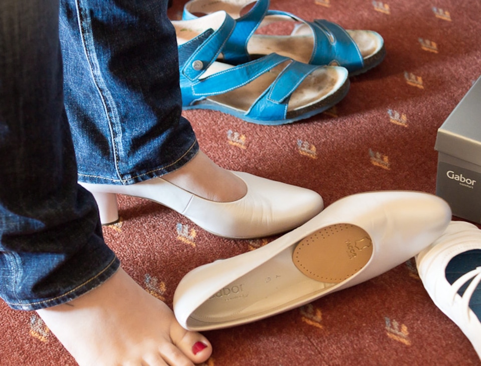 White shoe fitting foot