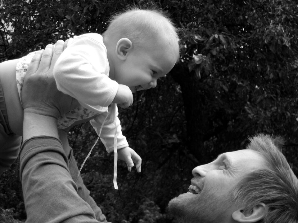 Joy father and daughter smile