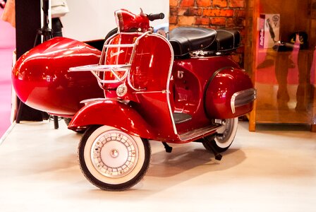 Vespa red bike sidecar