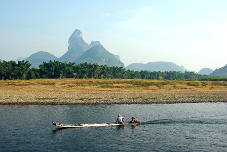 Boat fisherman valley photo