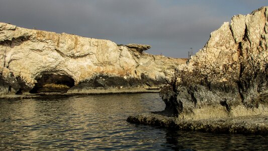 Cliffs sea sea cave photo