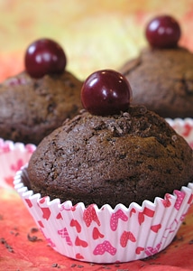 Baking homemade sour cherry muffins photo