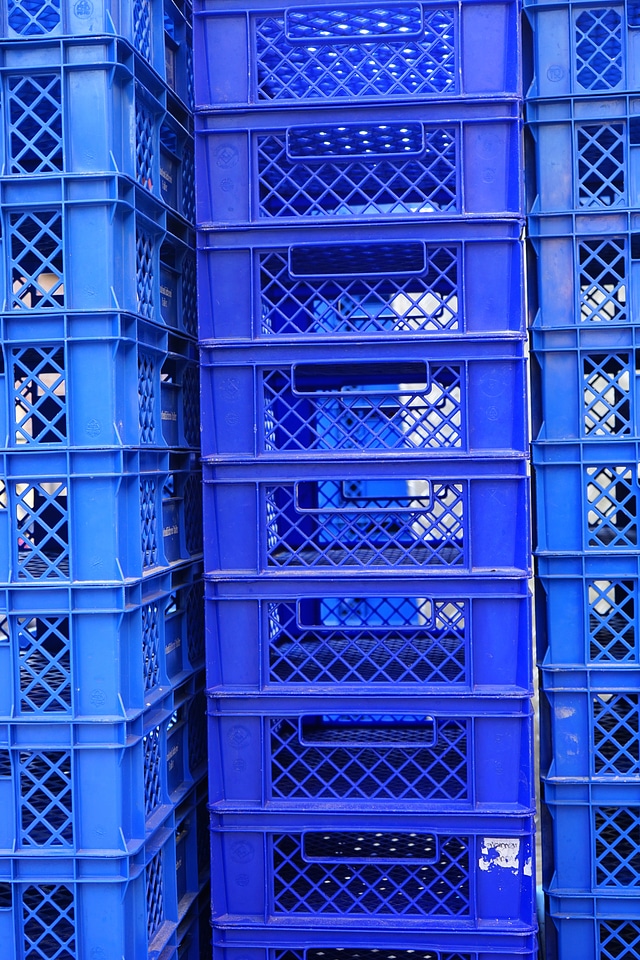 Blue stacked transport crates