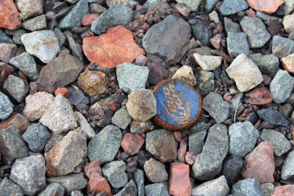 Garbage beer bottle cap pollution