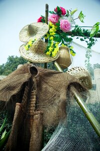 Flower straw rain cape