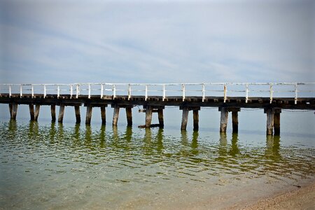 Bridge sea water photo