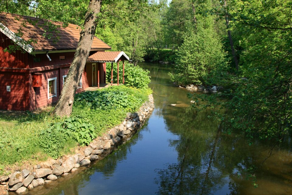 River brown house green landscape photo