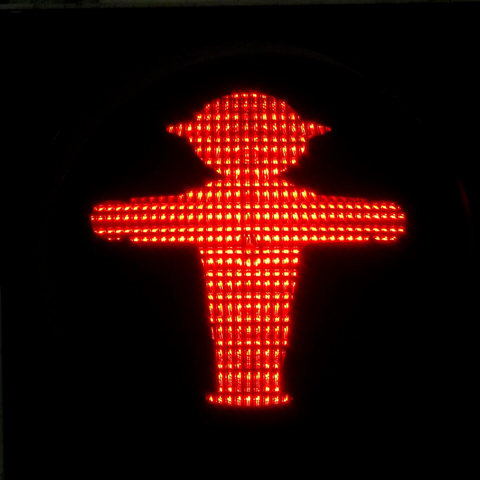 Red note road sign