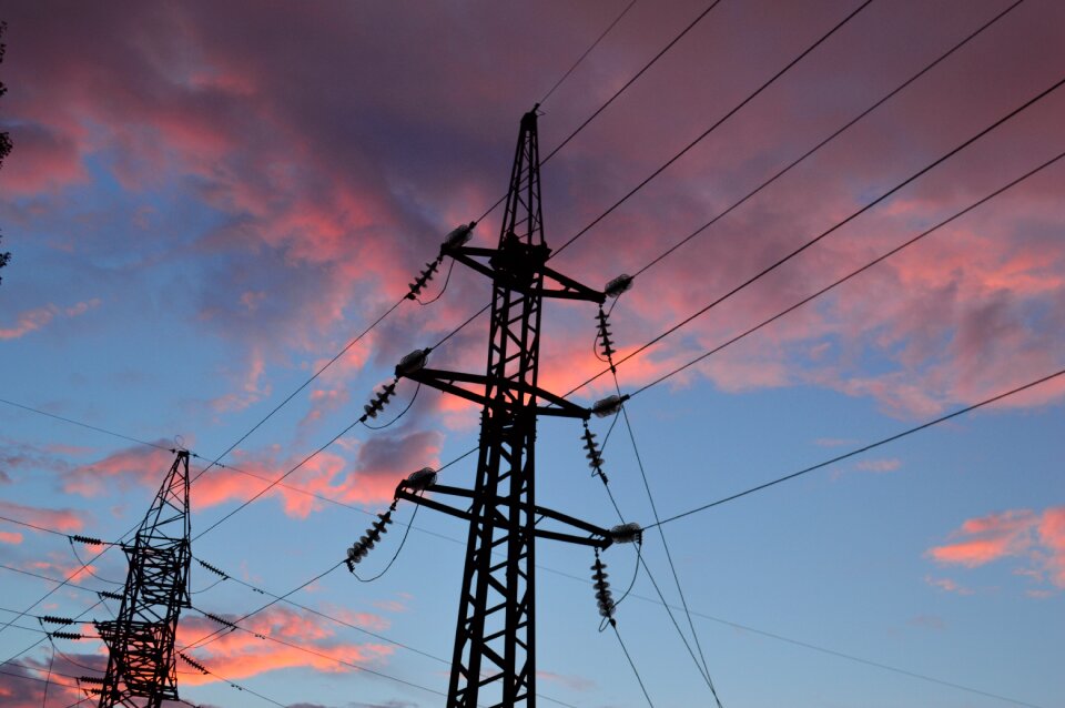 Cables and sky wire against the sky power poles
