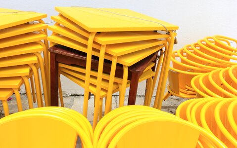 Chairs tables stacked photo