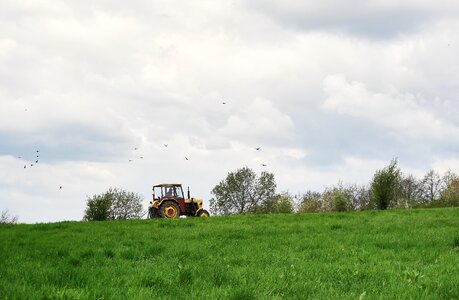 Agricultural machine working on the field spring