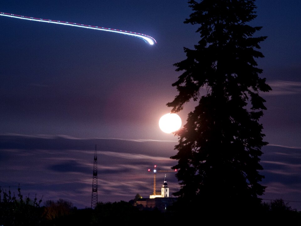 Aircraft sky moon at night photo