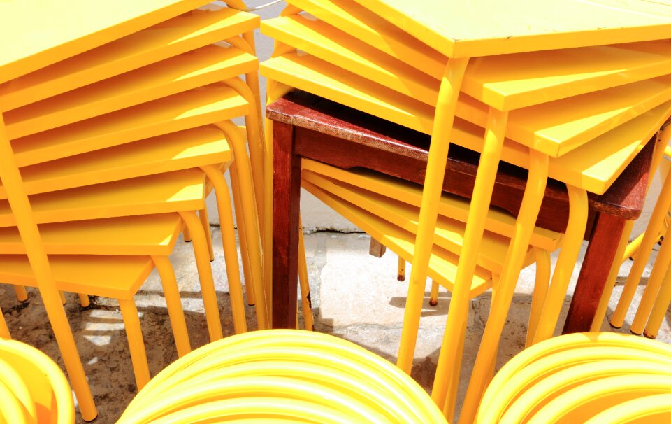 Chairs tables stacked photo